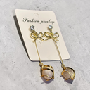 Elegant Ribbon Bow Pearl Dangle Earrings - Long Linear Gold-Toned Earrings